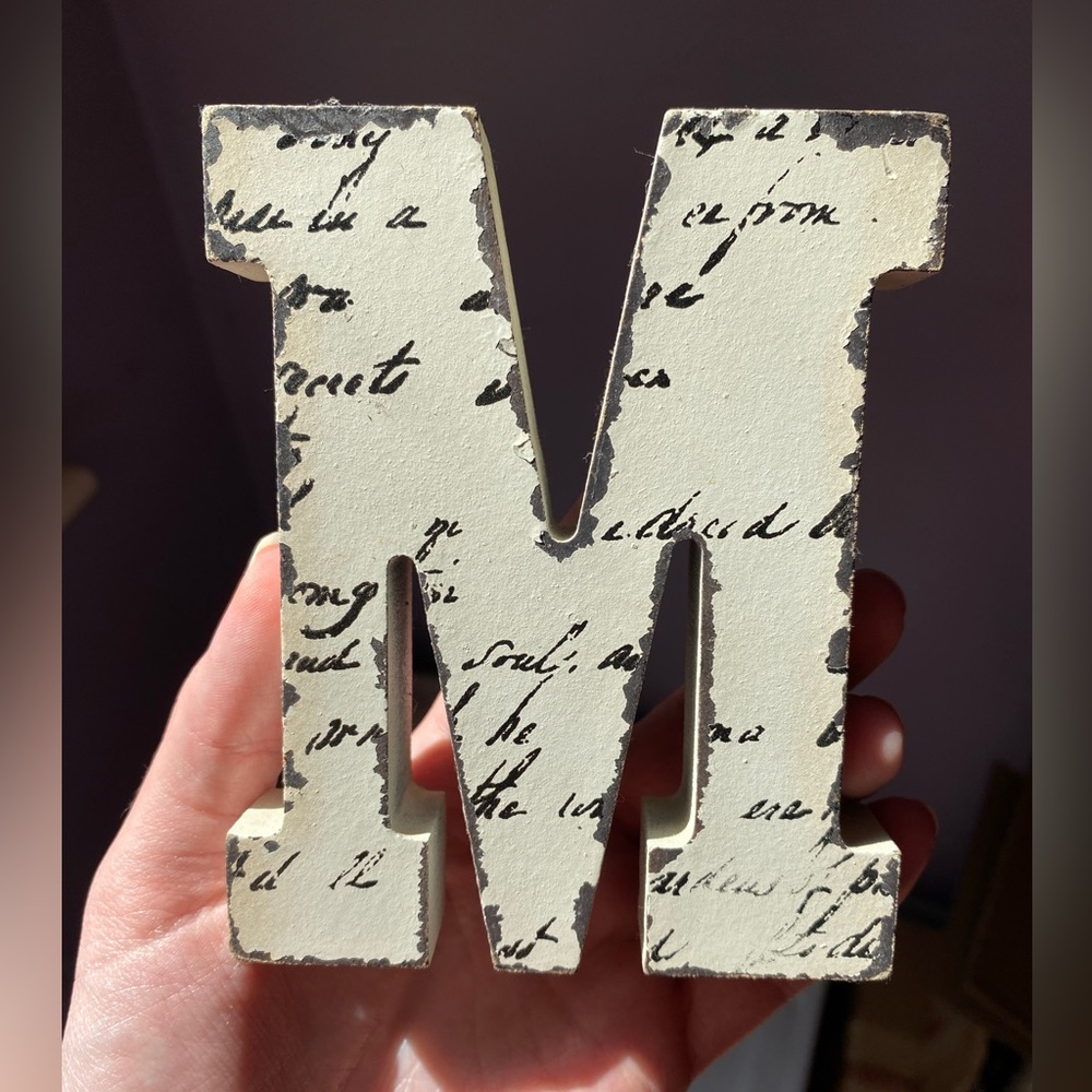 Letter M wood block with design on the front